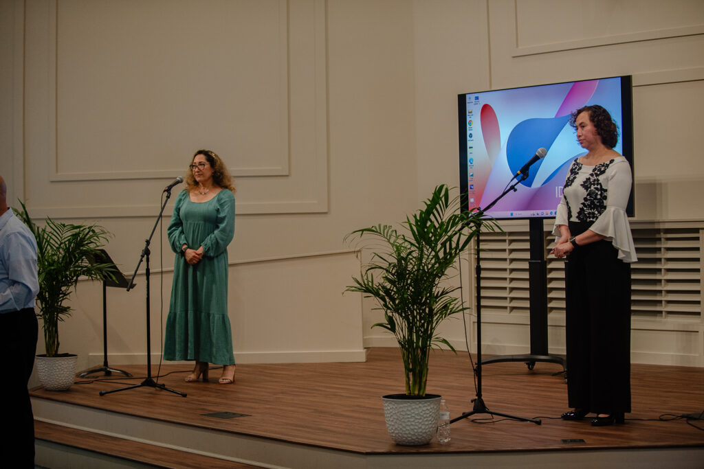 two women on stage